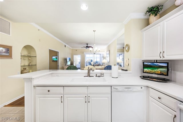 kitchen featuring decorative backsplash, dishwasher, white cabinetry, light hardwood / wood-style flooring, and sink