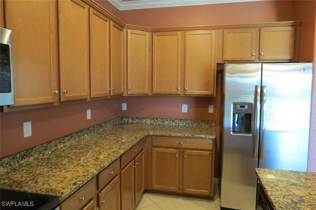 kitchen featuring stainless steel refrigerator with ice dispenser, ornamental molding, light tile patterned flooring, and light stone counters