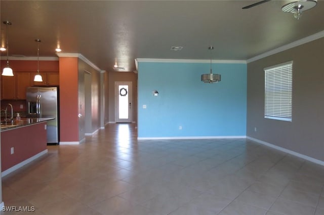 kitchen with hanging light fixtures, light tile patterned floors, ceiling fan, stainless steel fridge with ice dispenser, and crown molding