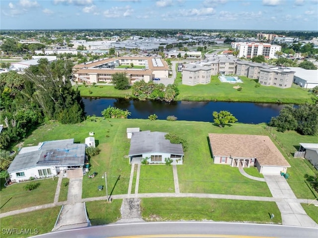 3107 Easy St, Port Charlotte, FL 33952 - aerial overview of property's location with a nearby body of water and apartment complex / building