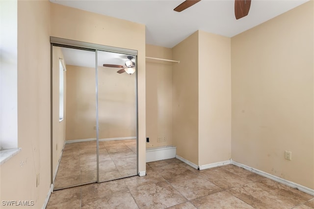 unfurnished bedroom featuring light tile patterned floors, a closet, and ceiling fan