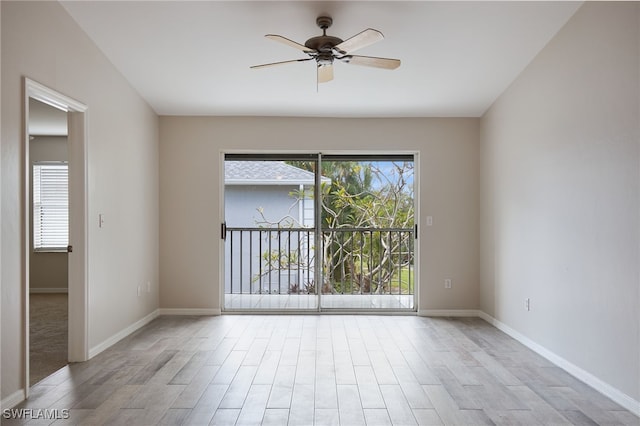 unfurnished room featuring ceiling fan and light hardwood / wood-style flooring