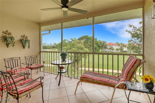 sunroom / solarium with ceiling fan