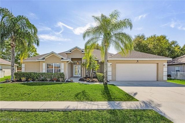 single story home with a garage and a front yard