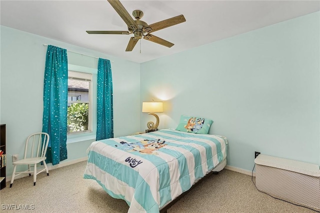 bedroom featuring ceiling fan and light colored carpet