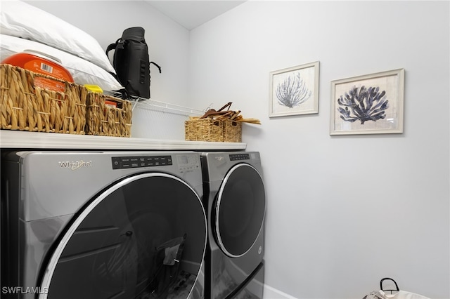 laundry area with washing machine and dryer