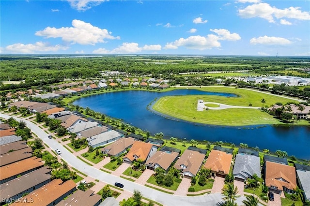 aerial view with a residential view and a water view