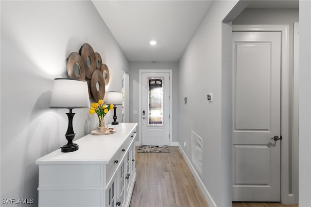 2740 Amaranda Ct, Naples, FL 34114 - doorway to outside with light wood finished floors, baseboards, visible vents, and recessed lighting