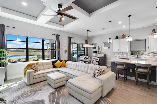 2740 Amaranda Ct, Naples, FL 34114 - living room with coffered ceiling, light wood-type flooring, recessed lighting, baseboards, and ceiling fan