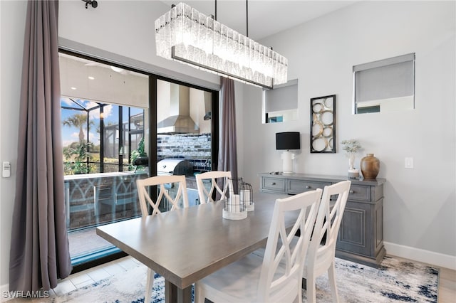 2740 Amaranda Ct, Naples, FL 34114 - dining room featuring baseboards