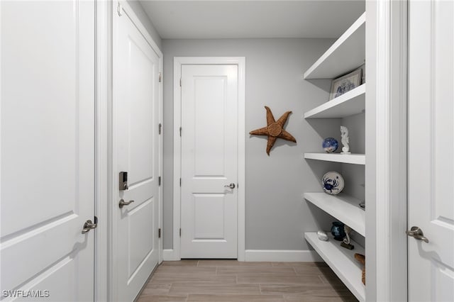 2740 Amaranda Ct, Naples, FL 34114 - interior space with baseboards and wood tiled floor
