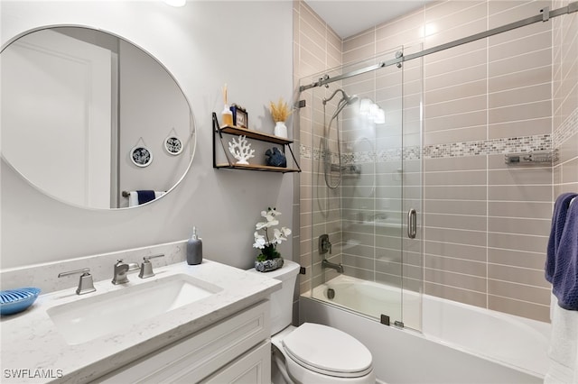 2740 Amaranda Ct, Naples, FL 34114 - full bath featuring toilet, vanity, and combined bath / shower with glass door