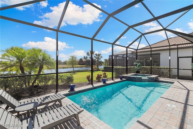 2740 Amaranda Ct, Naples, FL 34114 - view of swimming pool featuring glass enclosure, a water view, a pool with connected hot tub, and a patio area