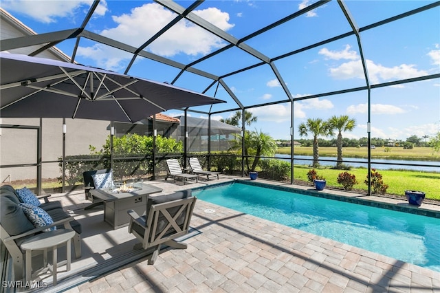 2740 Amaranda Ct, Naples, FL 34114 - outdoor pool with a fire pit, a water view, glass enclosure, and a patio area