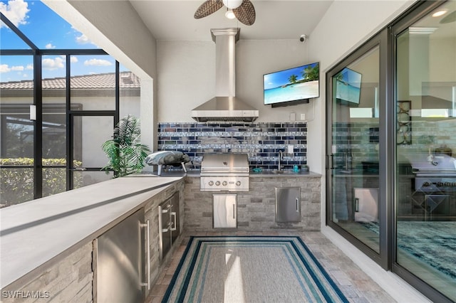 2740 Amaranda Ct, Naples, FL 34114 - view of patio / terrace with a lanai, a sink, ceiling fan, an outdoor kitchen, and area for grilling