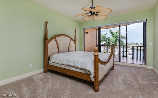 carpeted bedroom with ceiling fan and access to exterior