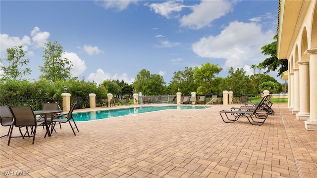 view of pool featuring a patio