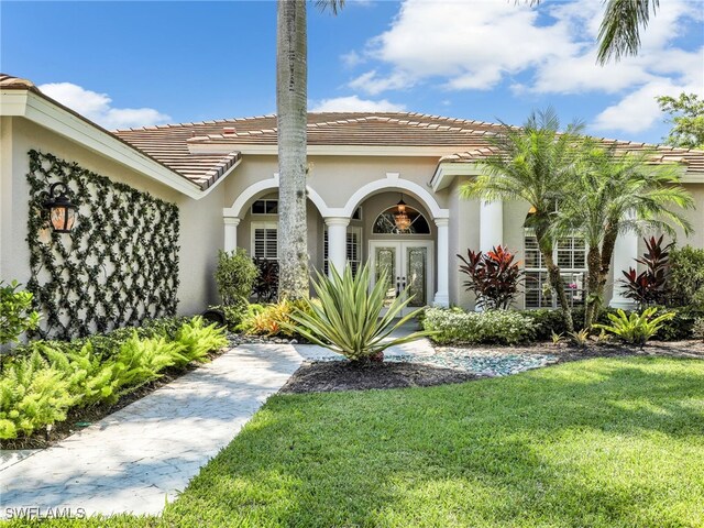 view of front of house with a front lawn