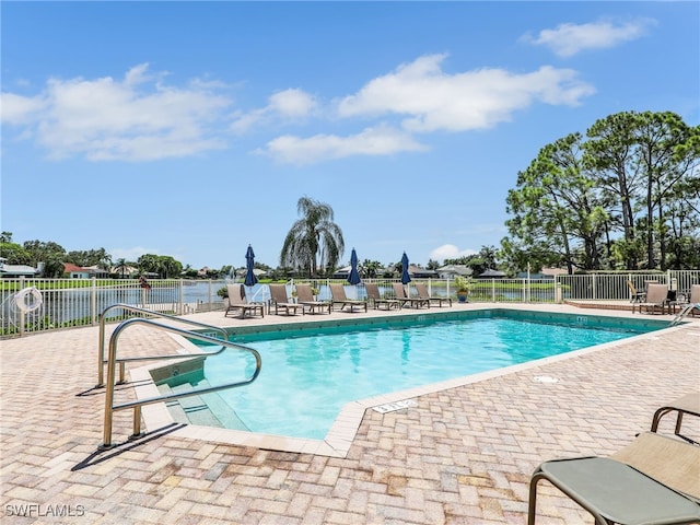 view of pool featuring a patio