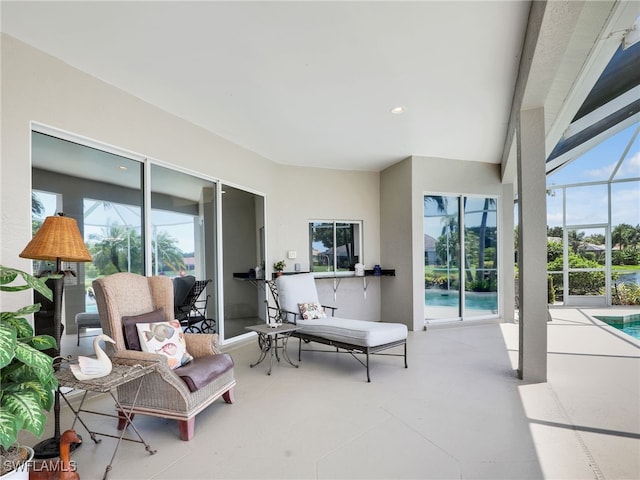 view of patio with a lanai