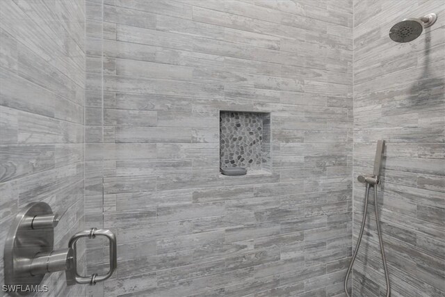 room details featuring an enclosed shower