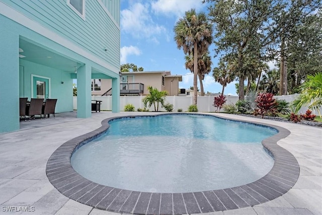 view of pool featuring a patio area