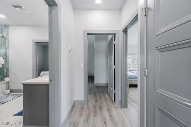 hall featuring light hardwood / wood-style flooring