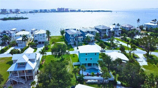 drone / aerial view with a water view