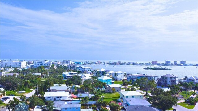 bird's eye view with a water view