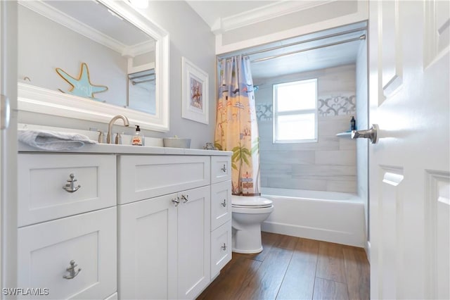 full bathroom with shower / bath combo, vanity, wood-type flooring, ornamental molding, and toilet