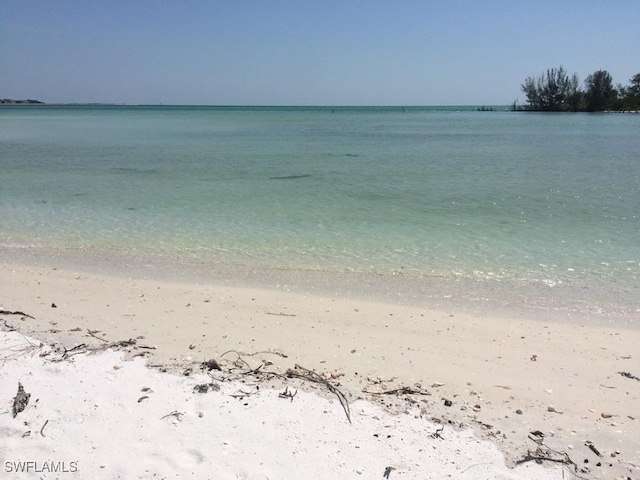 property view of water featuring a view of the beach