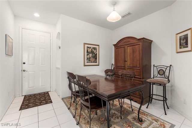 dining room featuring light tile patterned flooring