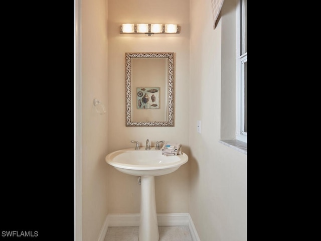 bathroom featuring baseboards