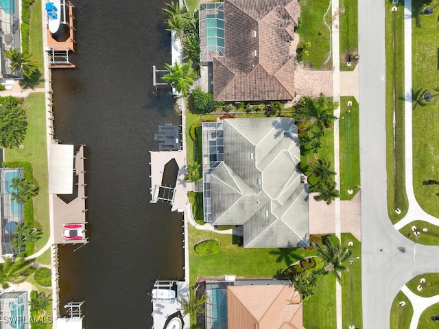 drone / aerial view featuring a water view