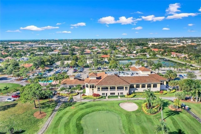 birds eye view of property with a residential view and golf course view