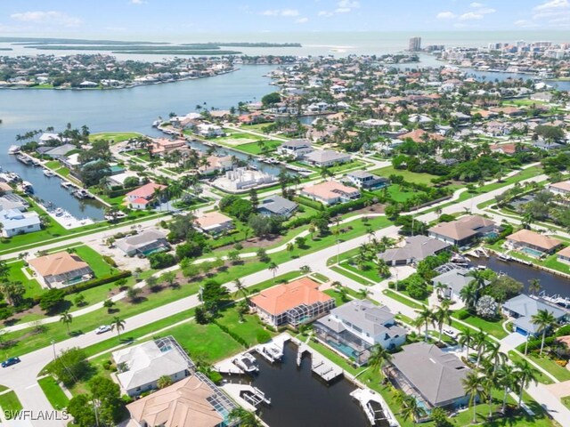 bird's eye view with a water view