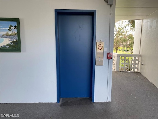 doorway to property with elevator