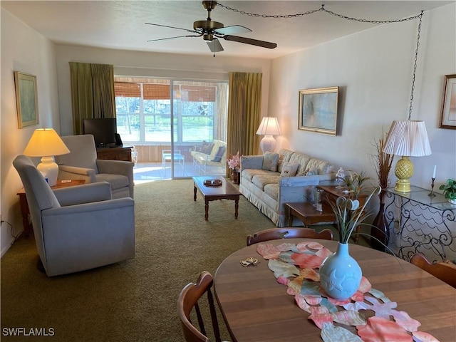 carpeted living room featuring ceiling fan