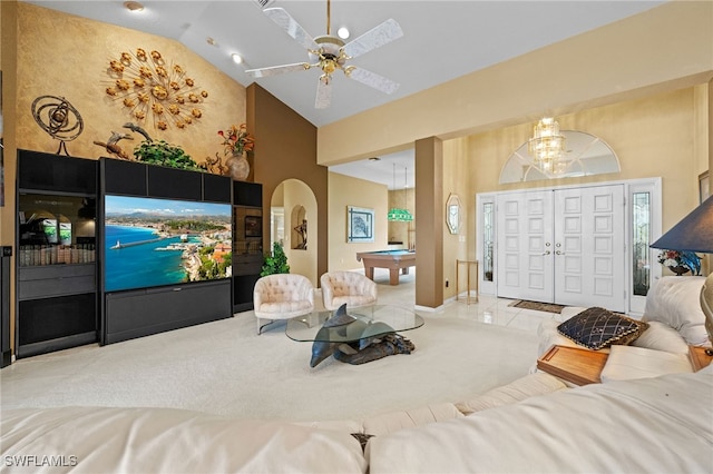 interior space featuring ceiling fan, light tile patterned floors, billiards, and high vaulted ceiling