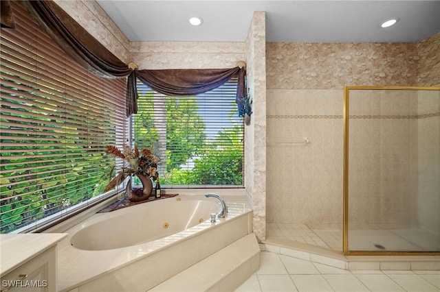 bathroom featuring separate shower and tub, tile patterned floors, and plenty of natural light