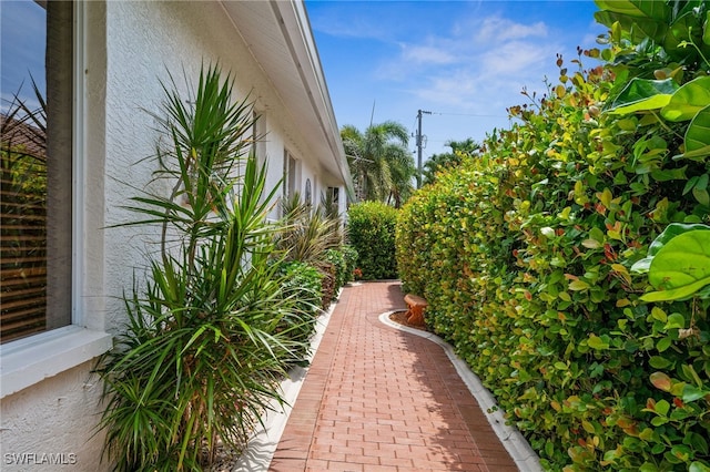 view of side of home featuring stucco siding