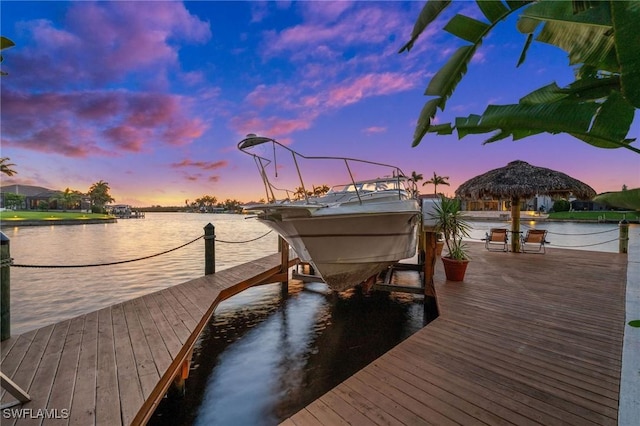 dock area featuring a water view and boat lift