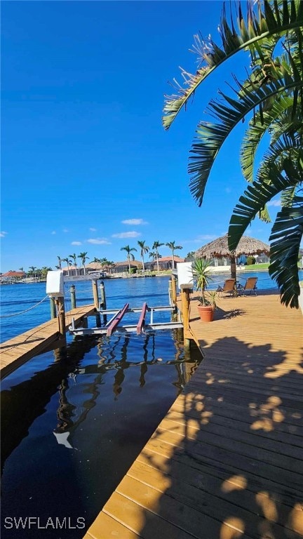 view of dock with a water view