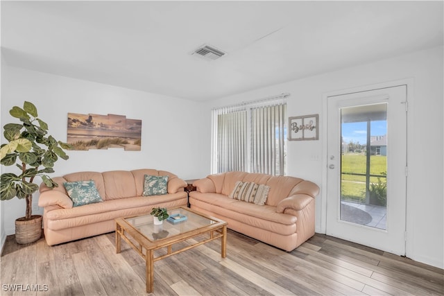 living room featuring light wood-type flooring