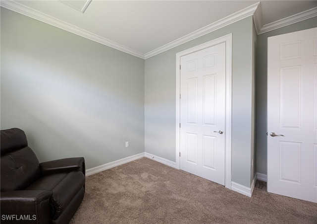 living area featuring carpet floors and crown molding