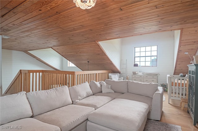 living room featuring light hardwood / wood-style flooring, wooden ceiling, and wood walls