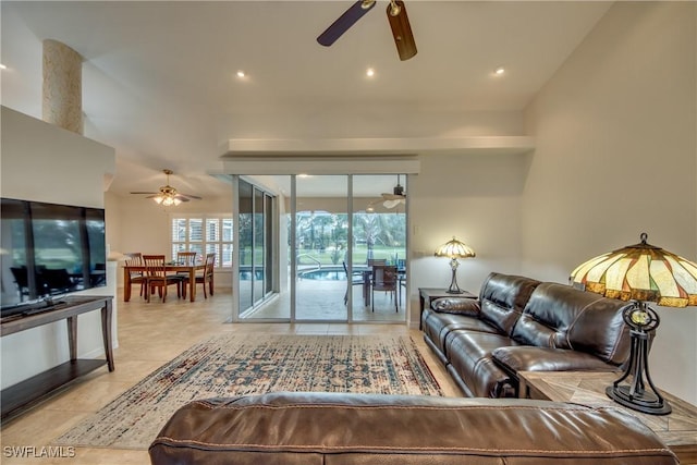 living area featuring recessed lighting, light tile patterned flooring, and ceiling fan