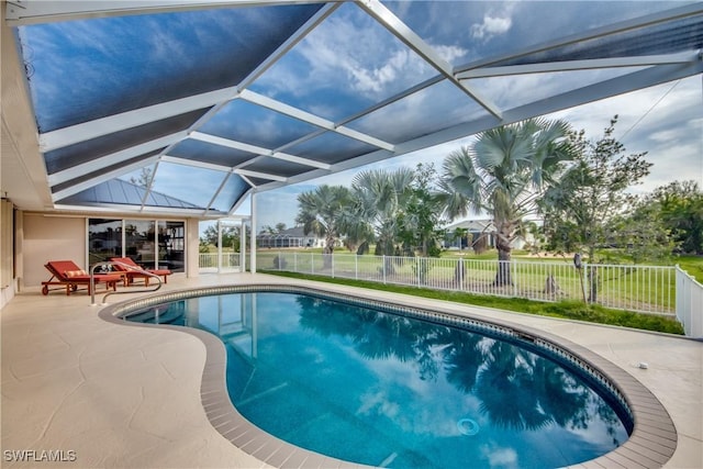 view of pool featuring a fenced in pool, a patio area, glass enclosure, and fence