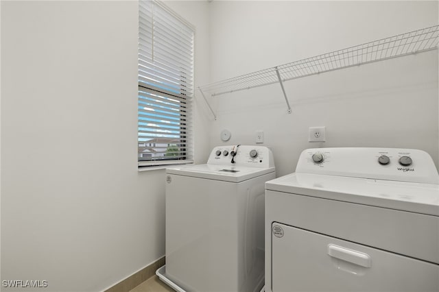 laundry area featuring separate washer and dryer