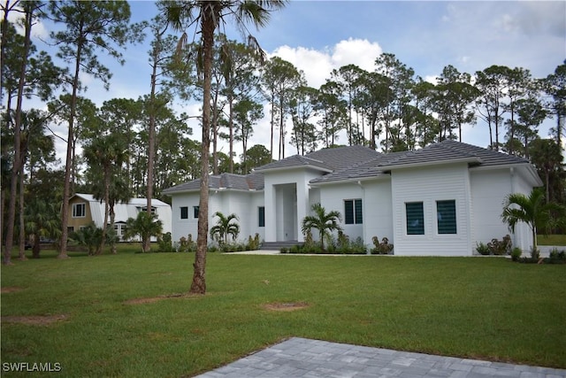 788 9th St SW, Naples, FL 34117 - prairie-style home with a front lawn